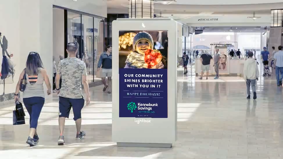 Kennebunk Savings community creative on a mall kiosk screen.