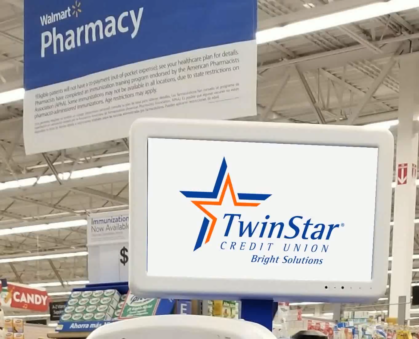 TwinStar Credit Union brand creative on an in-store pharmacy screen.